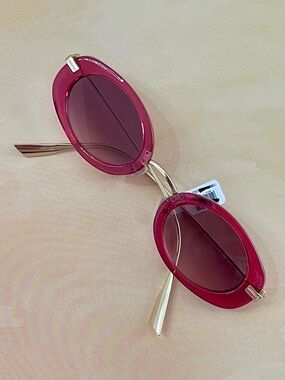 Free People Pinkish-Red Oval Sunglasses with Gold Accents and Gradient Lenses